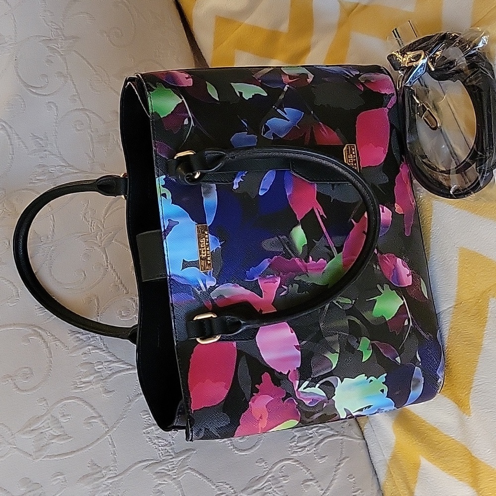 Trina Turk crossbody vegan leather floral handbag.